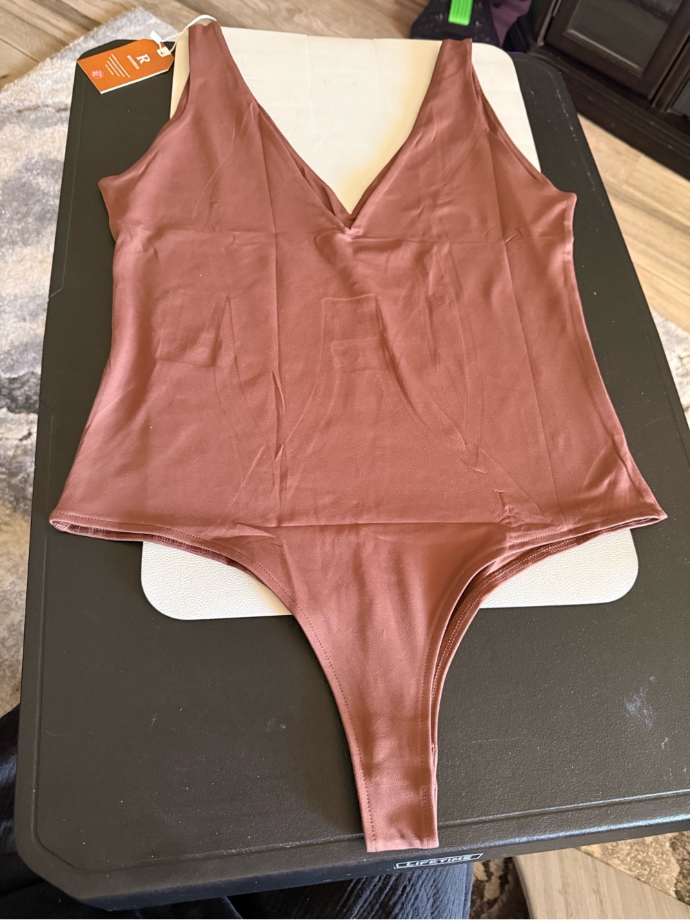 ReoRia Satin V-Neck Thong Bodysuit in Mauve